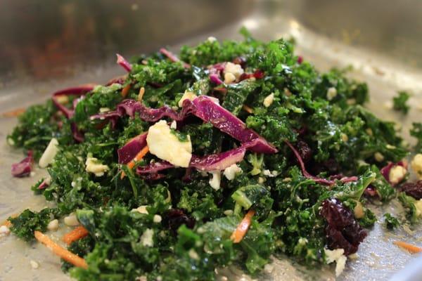 Our salad bar offers a variety of freshly tossed salads like this kale salad