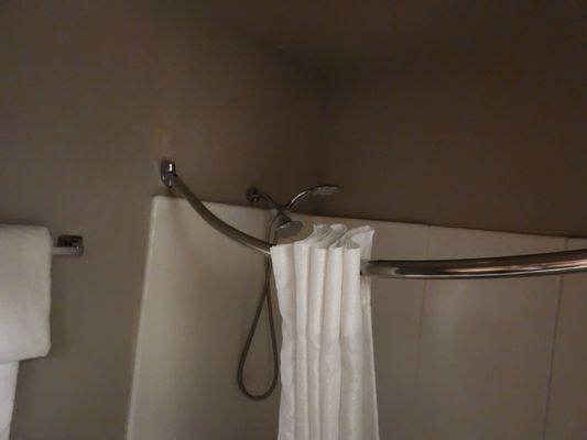 Shower curtain rod falling off the wall