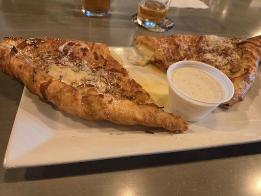 Pepperoni Calzone w/ a side of peppercorn ranch. .....absolutely delicious!