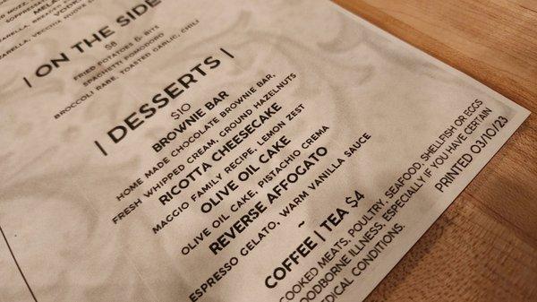 The menu describing the lemon zest ricotta cheesecake