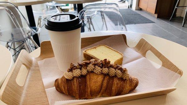 Puff pastry cake and coffee croissant