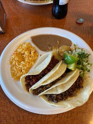 Taco plate, with two bistec tacos and one Al pastor taco