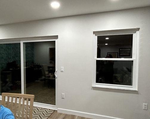 New sliding glass door and new living room window.