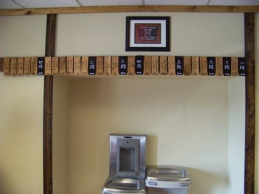 These plates represent the names of the black belts that train in karate at our dojo. 24 names from 1st degree - 8th degree.