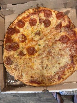 Half pepperoni, half cheese pizza