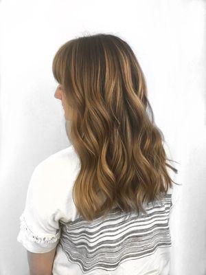 Balayage technique to create dimension and natural looking highlights.