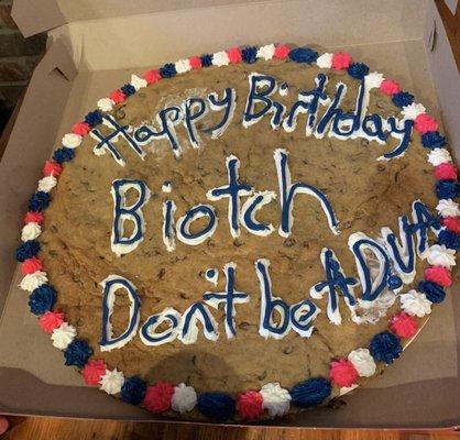 Bad writing on cookie cake.