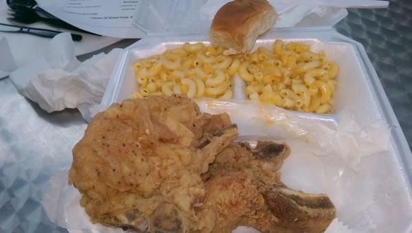 Fried pork chops, double mac-n-cheese, rolls. $9.78 or something close to that. Dadgum delectable!