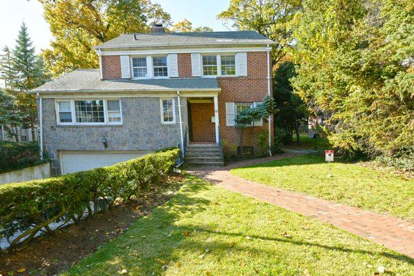 Welcome to this center hall colonial with 9 bedrooms, 5 full baths, and 2 half baths.