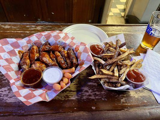 Uber hot wings with a side of fries