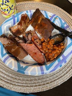 Three meat platter + baked beans! (Brisket/ribs/sausage)