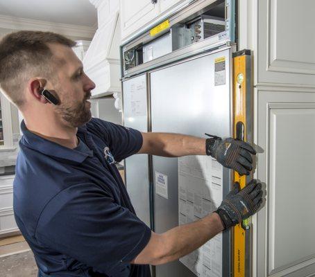 We always ensure appliances are level before securing the installation.