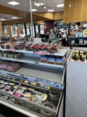 Groceries as well as a service counter are found inside