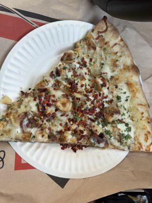 Chicken Bacon Ranch Pizza with red pepper flakes