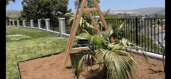 About 200 linear feet of galvanized inside and out and powder coated gloss black fence panels with a center post, in between pilasters.