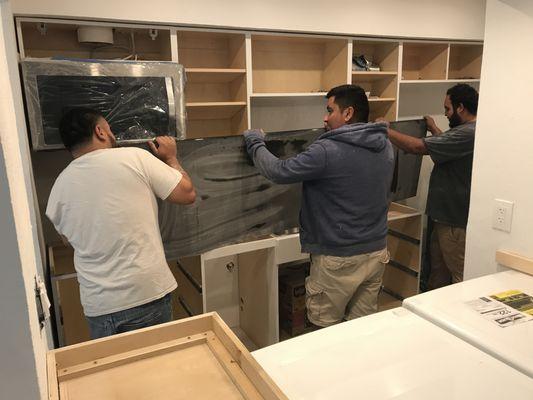 Installing new granite and quartzite countertops.
 Oak Lawn, Dallas, TX