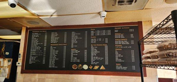 Menu.  What is the difference between "zatar with cheese $5.25" and "cheese with zatar $5.49"?  Oh.. what is a zatar?