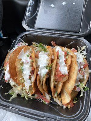 Fried Taco. Beef with pico and sour cream. Get ya some of their hot sauce to make it extra bang'n.