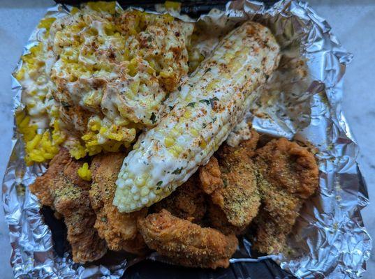 Wings (lemon pepper) combo with corn on the cob and yellow rice