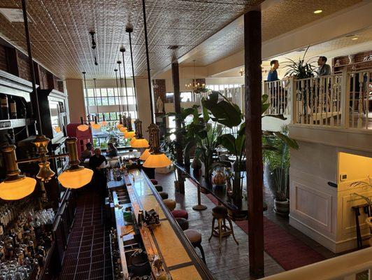 interior from balcony.  overlooking bar.