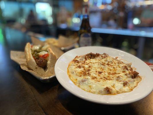 Sausage and peppers sandwich and Sloppy Giuseppe sandwich in a bowl option