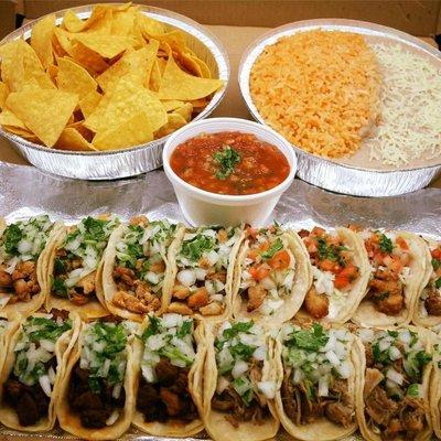 Our Taco Box has 20 Tacos, Beans, Rice and a Full order of chips & salsa!