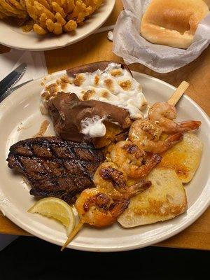 Steak, shrimp, baked sweet potato