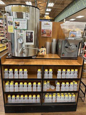 Self serve honey dispenser and plastic containers