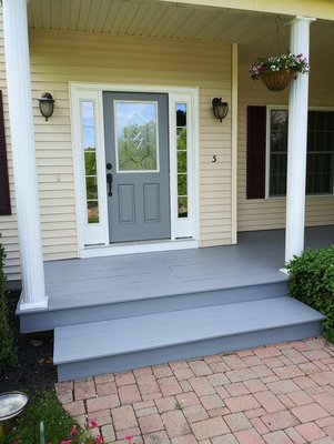 Pressure washed and stained deck, painted door to match and fresh coat on trim