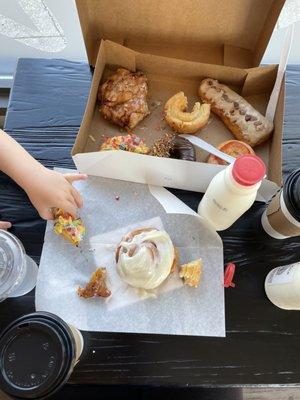 We all shared a 1/2 dozen and a cinnamon roll. Check out Cruze farm milk, got to get there early if you want the coffee milk though!