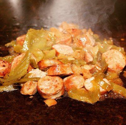 Sausage, Pepper, and Onion cooking on the grill.