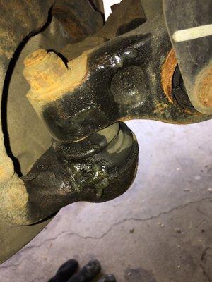 Pretty obvious the lower ball joint is bad. Mechanic didn't even look at it.