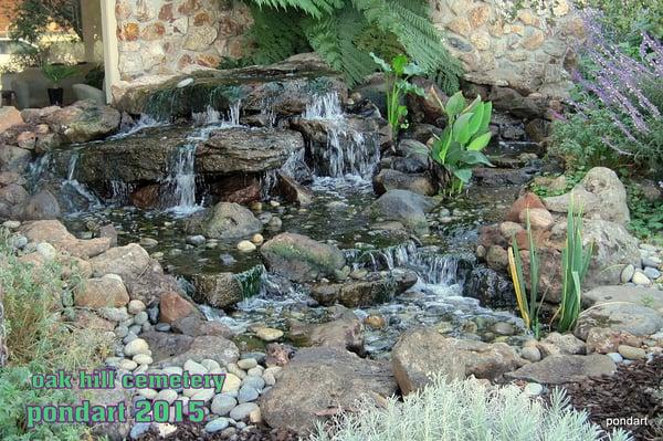 Pondless water feature using 3,000 lb coldwater canyon slabs into a 200 gal recirculating reservoir. 2 pumps: 10,000 and 3,000 gph