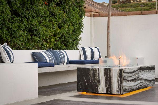 Outdoor Living Area! Custom Floating Bench and Fire Pit.