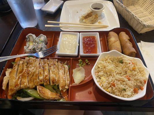 Lunch Bento box with fried rice and chicken teriyaki.