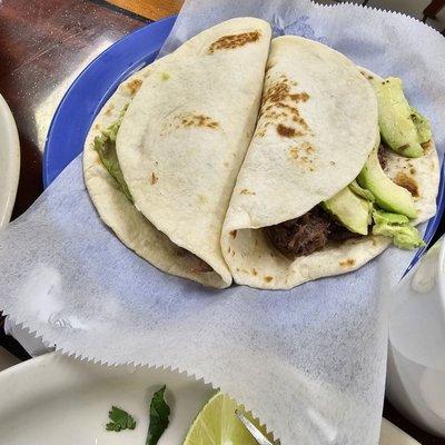 Barbacoa tacos and added avocado