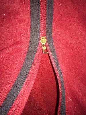 "fixed" my broken zipper. And replaced it inside out. Not acceptable or professional.