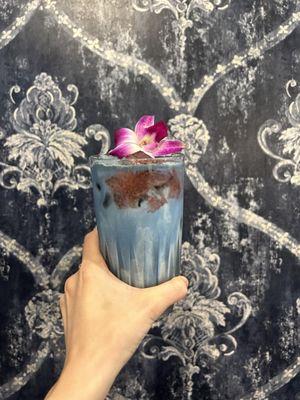 Flutter By Tea Latte: Caffeine-free energy boost with butterfly pea flower, Siberian ginsing, Chlorella, & pea protein.