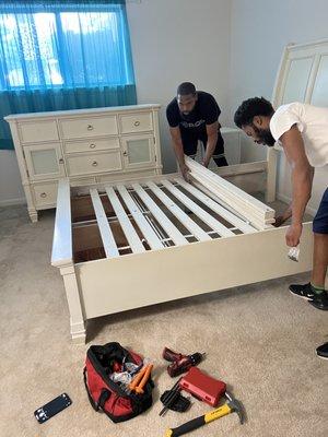 Taking apart a bed.