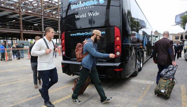 Anthony Rizzo and Jake Arrieta about to get on our motor coach!