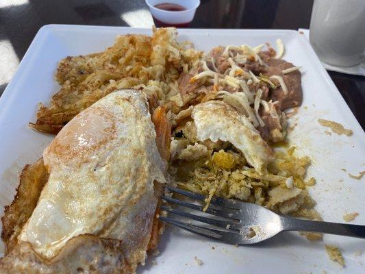 Huevos Montadas--tamales topped with eggs.