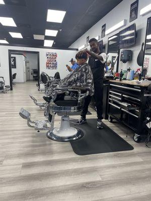 My son getting a low fade.