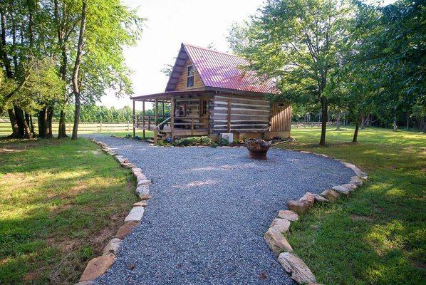 Fire pit for use between cabins.  Adirondack chairs are there for your use and we have a picnic table and grill if you choose to dine in!