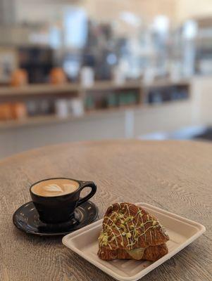 Flat white + Pistachio croissant