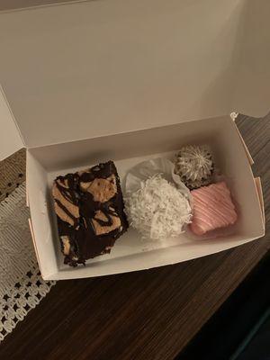 S'mores brownie, coconut cake ball thing, Oreo cheesecake, strawberry petit four