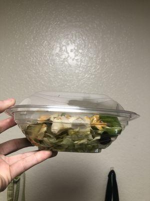 Showing not even half of the salad container was filled