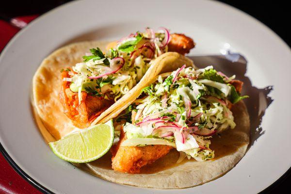 -fish tacos-
crispy breaded rock cod, cabbage slaw, lime, avocado crema (pescatarian/gf)