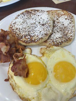 Pancake platter - 2 eggs your way, bacon or sausage and pancakes - $12.99