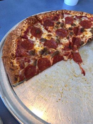 Sausage and pepperoni pizza.