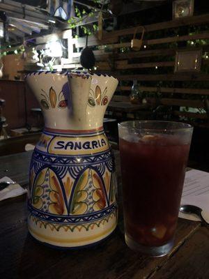 Yummy red sangria served in this beautiful ceramic pitcher.